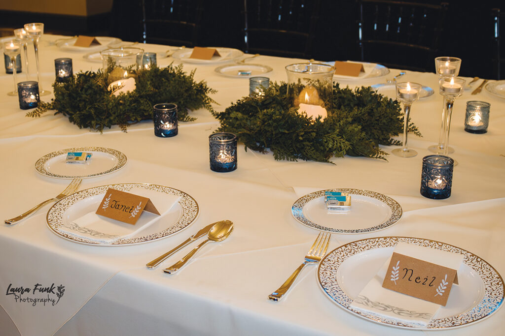 table place settings for filled with beautiful greenery centerpieces
