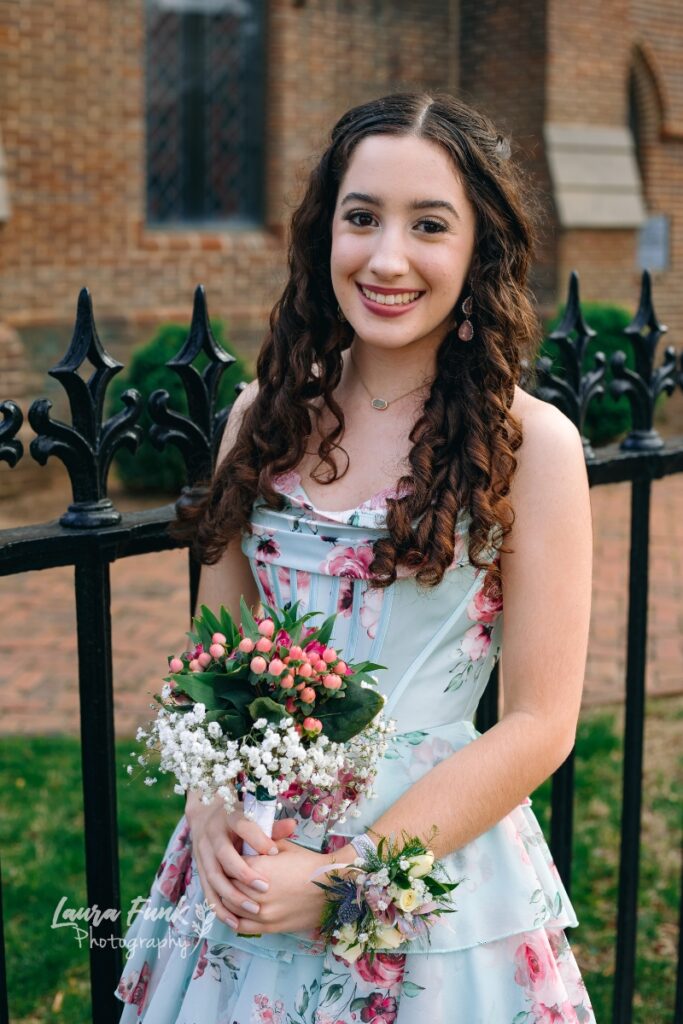 girl in a flowered prom dress