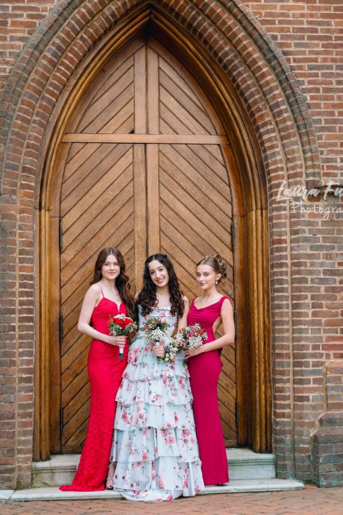 3 friends standing for a prom photo session